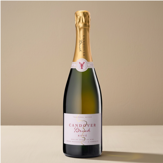 A bottle of Candover Brook Rosé NV with gold foil 